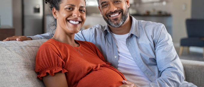 Couple. Preganant woman. Preparing for a baby.